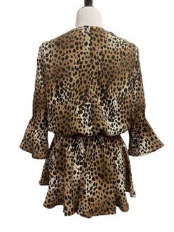 Leopard print dress on a mannequin against a white background
