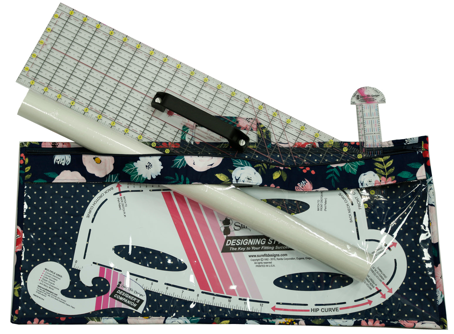 Set of sewing tools including a ruler, cutting mat, and pattern guide on a white background