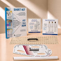 Sure Fit Designers shirt fitting kit displayed on a beige surface with warm sunlight shadows. The kit includes a main instruction booklet, three smaller course/booklet covers, a clear gridded cutting mat, a black rotary cutter, a white arched template, and a white roll of paper.