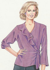 Woman wearing a purple blouse with ruffled details