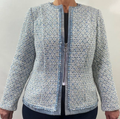 Light blue textured jacket with a zipper on a plain background
